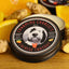 Photo of Charming Charlie’s Magical Beard Balm – Chinese Takeout  A beard balm tin sits on a wood cutting board surrounded by oranges and ginger.